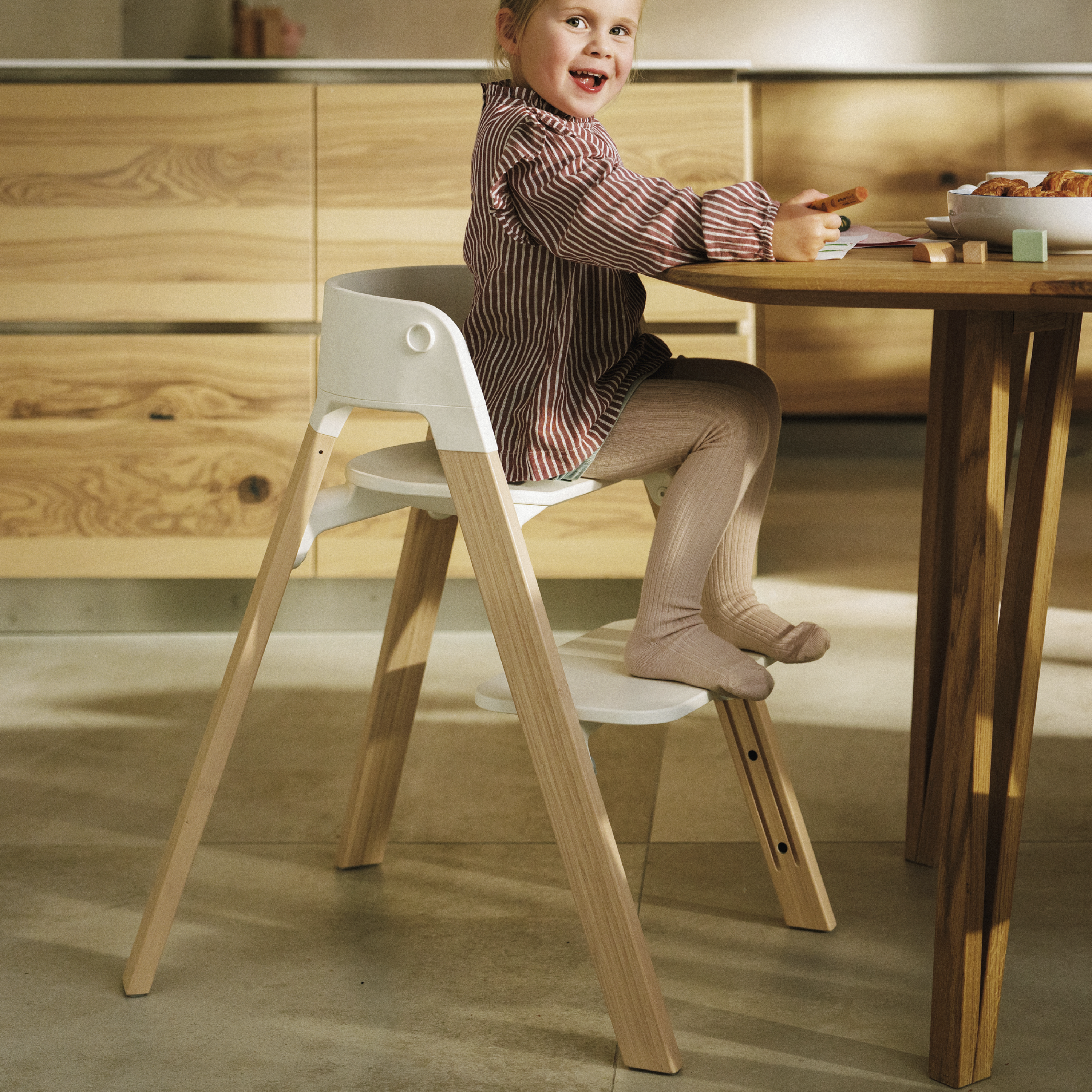 Steps™ | The convertible high chair that adapts with your child